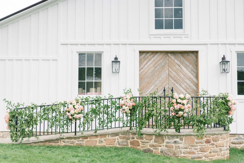 The Barns at Crest Hill Main Climate-Controlled Barn Wedding front door wedding decor