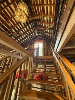 The Barns at Crest Hill Barn Pub second floor stairs going up
