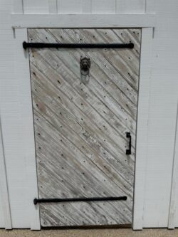 The Barns at Crest Hill Fireplace Patio Barn Pub side door exterior