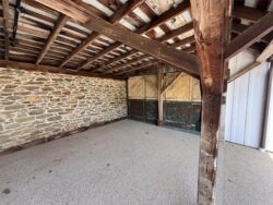 The Barns at Crest Hill Fireplace Patio covered area facing Barn Pub