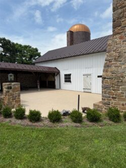 The Barns at Crest Hill Fireplace Patio facing barns