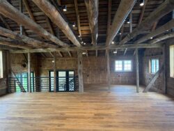 The Barns at Crest Hill Main Barn interior facing fireplace patio