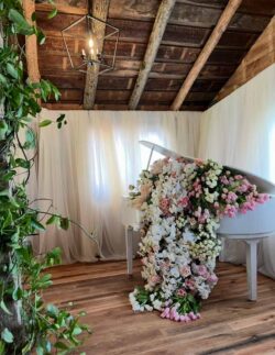 The Barns at Crest Hill Main Barn with decorated piano